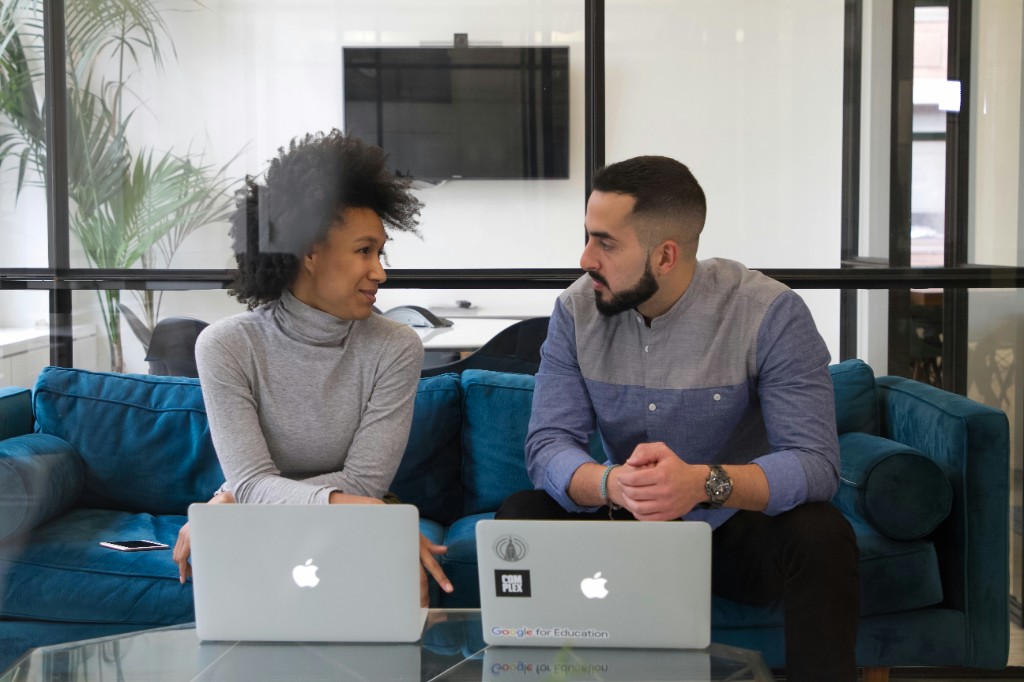 A TopNotch team member working with a member at the Business Centre